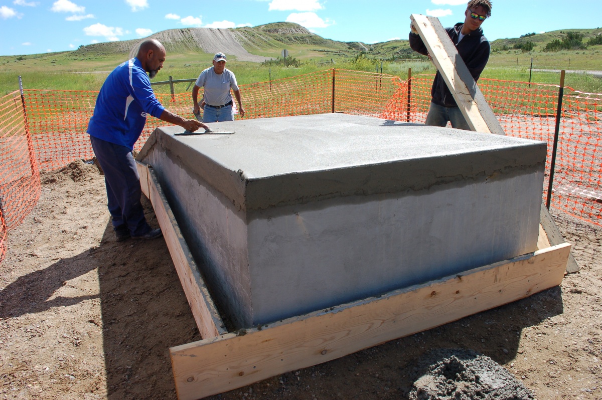 Volunteers help install loading ramps