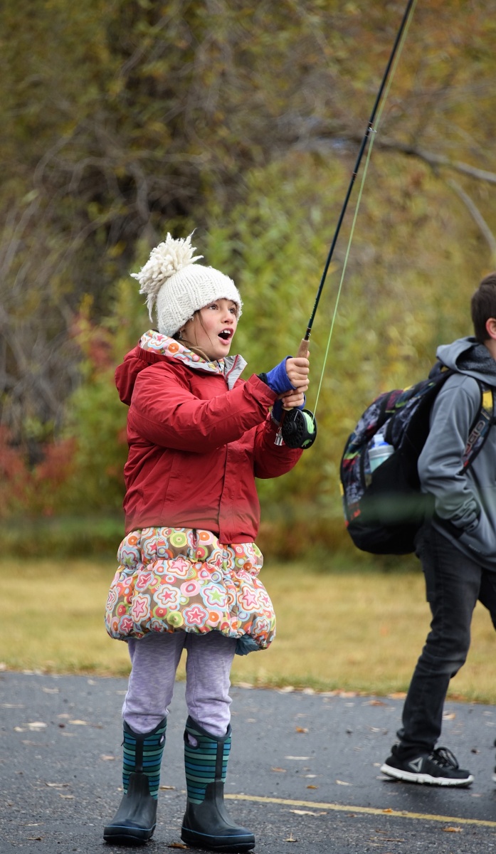 Local outfitters teach kids how to cast with colored yarn and hula-hoops