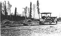 old excavator clearing the land for airstrip