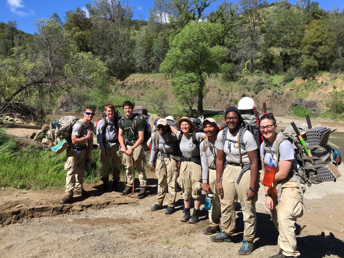 AmeriCorps members stop for a group picture as they begin their trail work assignment.   Photo by AmeriCorps NCCC Pacific Region, Green Unit, Team 1.