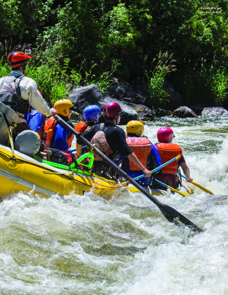 White water rafters go down river