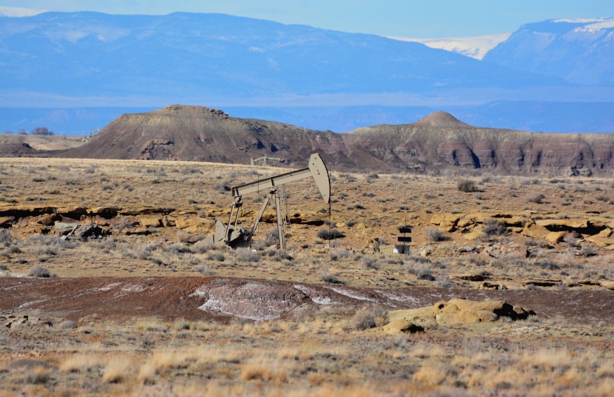 This oil and gas pumping unit has been painted a color that helps it blend in with the surrounding landscape. Photo by Ryan Sutherland.