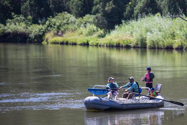 raft with four people recreating on upper colorado river