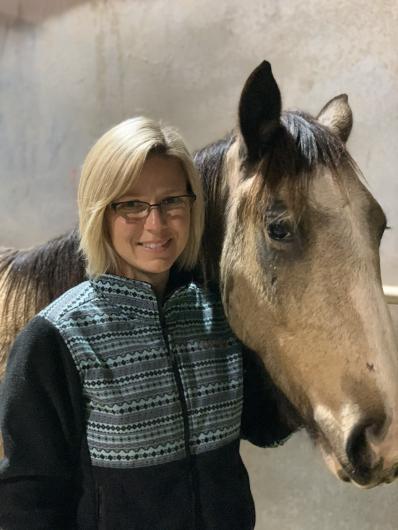 Laura Newberry and her first mustang Buckeye Boone