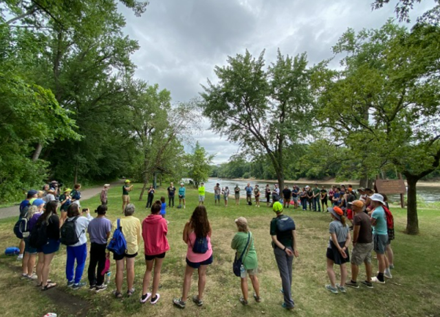 A group gathers for instructions prior to heading out on the water. (Photo courtesy of Wilderness Inquiry)