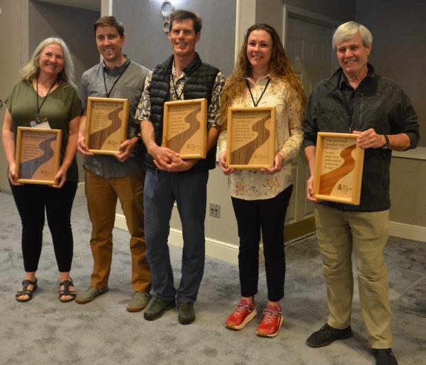 Left to right: Kristina Rylands, Upper Merced River Watershed Council (received the Outstanding Contribution to the River Management Society award); Steve Chesterton, U.S. Forest Service (received the River Manager of the Year award); David Greenwood, Bureau of Land Management - California (received the Outstanding Contribution to River Management award); Denielle Perry, Northern Arizona University (received the Frank Church Wild and Scenic Rivers Award 2023); and Bob Ratcliffe, retired National Park Servic