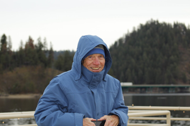 An attendee of the BLM Veteran Eagle Cruise takes a break from eagle sighting to smile for the camera. (photo by Alexa Oyola)