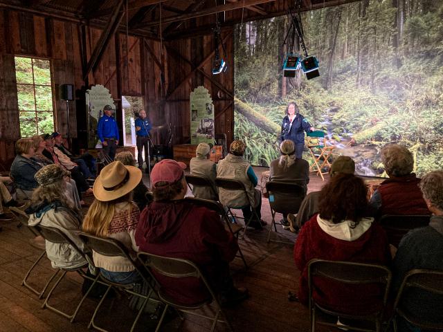 Photo of BLM Deputy Director for State Operations Karen Kelleher speaking with guest. Photo by Salah Ahmed, BLM.