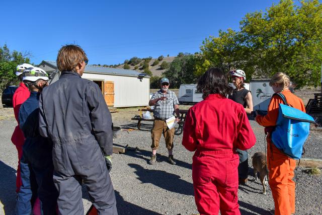 Knutt Peterson, cave specialist for the BLM Roswell Field Office, holds a briefing before the trip into Fort Stanton Cave.