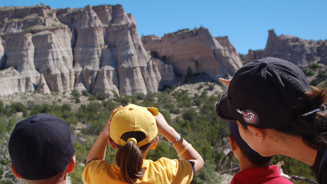 Children stand on an overlook at children Kasha-Katuwe Tent Rocks