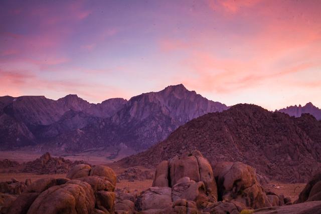 Sunset over a tall mountain range