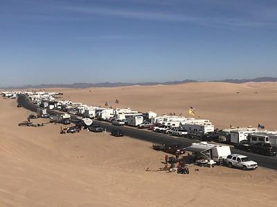 A line of campers at imperial sand dunes