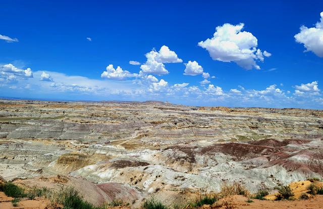 The rugged terrain of Angel peak under a New Mexico blue sky.