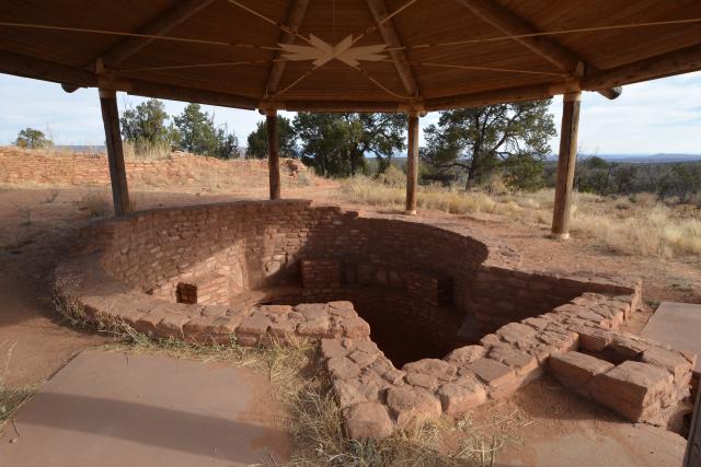 An inground Kiva with a canopy built over it.