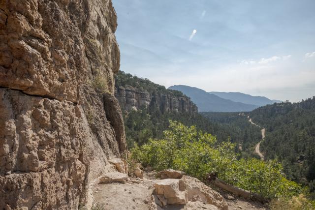 Along a sheer rock face, a small trail leads to some of the best winter climbing on the front range.