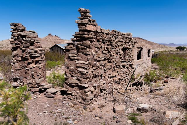 Remains of a building slowly crumbling.