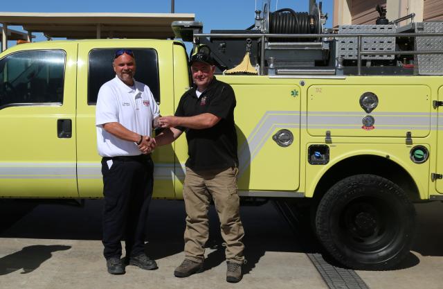 CRD Engine Captain hands Keys to Lake Mohave Ranchos Fire Chief