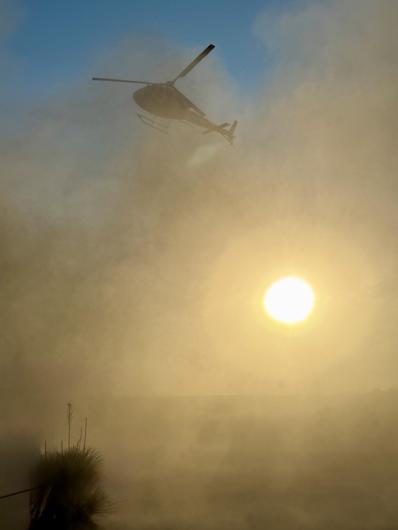 A helicopter crew rescues a patient during a rescue at Parks Ranch Cave near Carlsbad, New Mexico.