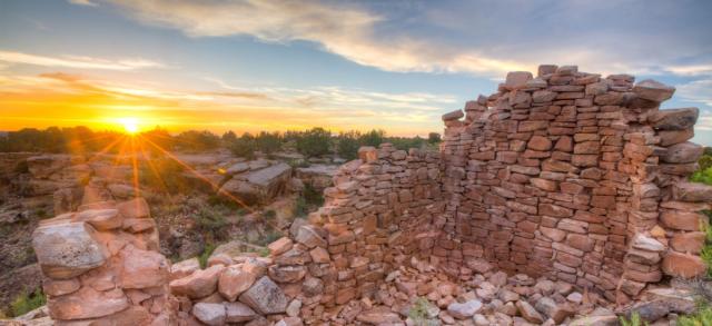 Ruins of ancient brick dwelling on ridge overlooking Canyons of the Ancients National Monument. 