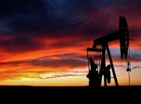 Pump jack at sunset.