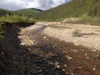 Image of stream in narrow valley