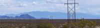 Photo of a powerline crossing desert terrain in Nevada.