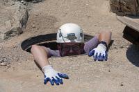  CFO staff Michael Barrett entering Lost Cave. 