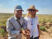 ACE interns Matt Jackson and Connor Stamps pose with a Texas horned lizard.