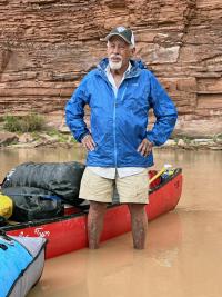 Milt wades in water