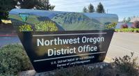 blm sign near a parking lot stating Northwest Oregon District Office
