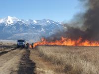 BLM fire crews manage a prescribed burn at Blanca Wetlands in Colorado's San Luis Valley in February, 2024.
