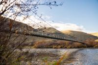 suspension bridge above a river