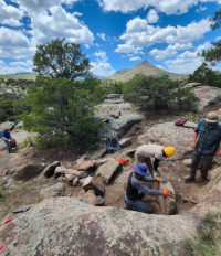 Volunteers performing trail maintenance at the Pronghorn trail system.