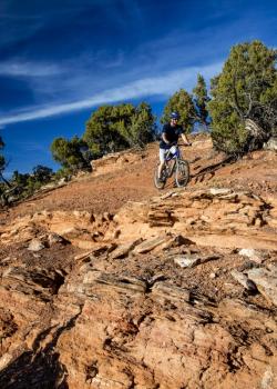 Mountain biker riding on Johnny Behind the Rocks Trail