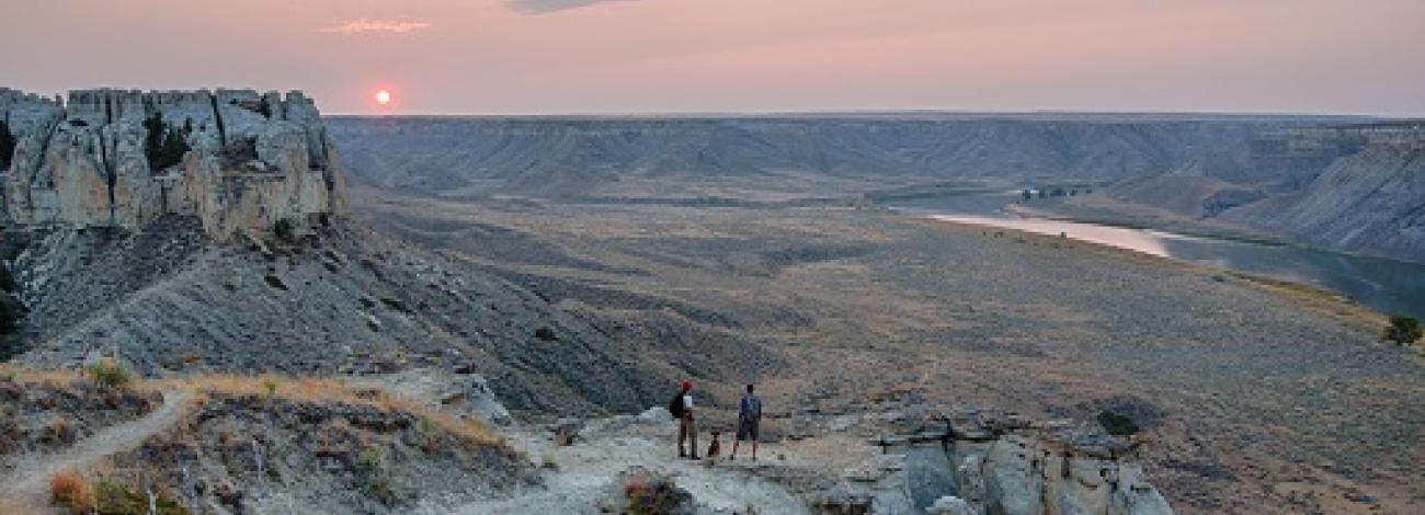 Hikers watch the sun set along the Upper Missouri River, Montana, photo by Bob Wick, BLM