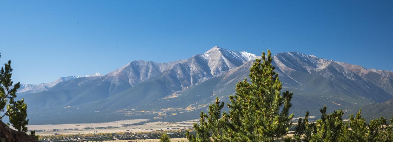 Colorado's Collegiate Peaks tower over Buena Vista and the Arkansas River.