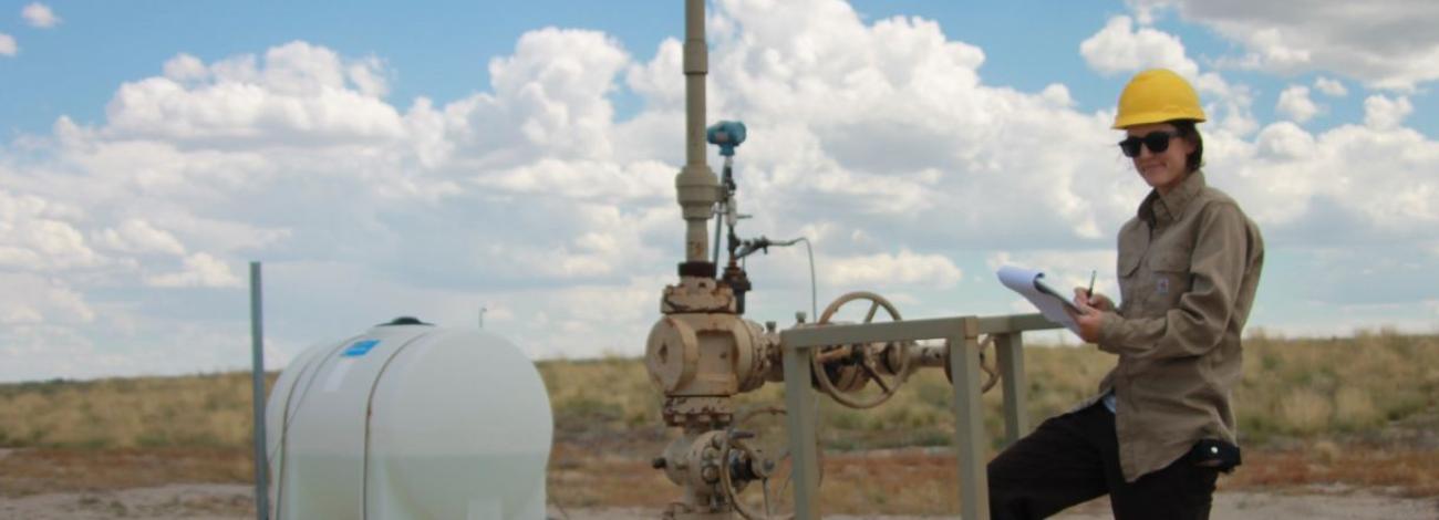 A BLM intern works at an oil and gas property in Fremont County, Wyoming in 2015.