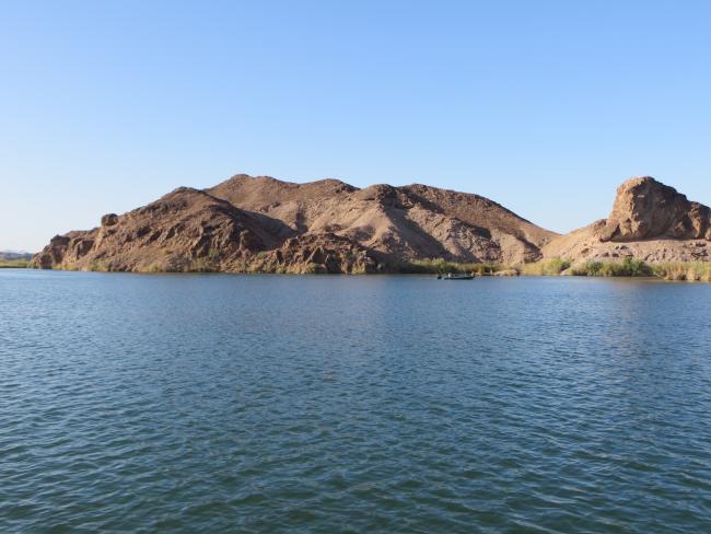 a lake with a mountain range