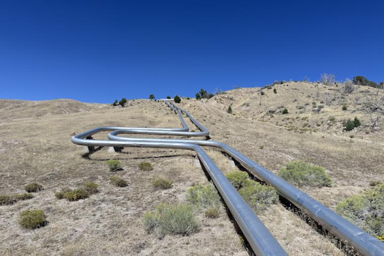 Photo 1: Geothermal pipelines running across BLM managed lands in Beaver County, UT. Photo by: JD Mallory