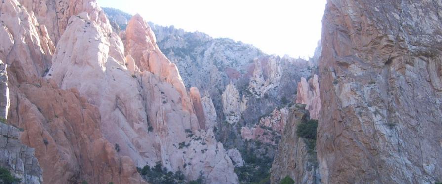 rugged peak with steep slopes carved by narrow canyons