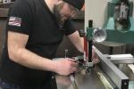 Man working on a band saw