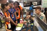 Bob King talking to scouts at the Department of Interior booth at the Scouts Jamboree