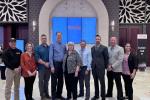 Nick Howell and Shawn Peterson of Color Paria Fuels Team stand with members of the Wildland Fire Mitigation Award Committee.