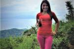 Jenifer Pable drinking Sago Gulaman and posing in front of one of the many active volcanos in Tagaytay. Photo courtesy of Jennifer Pable.