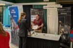Career fair booth for the Bureau of Land Management, featuring oil and gas and solid minerals displays.