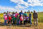 Members of Girl Scouts Troop 18044 and Bureau of Land Management staff pose for a photo during a National Public Lands Day cleanup event at the Bureau of Land Management Roswell Field Office’s Oxbow Day Use Area on Sept. 12.